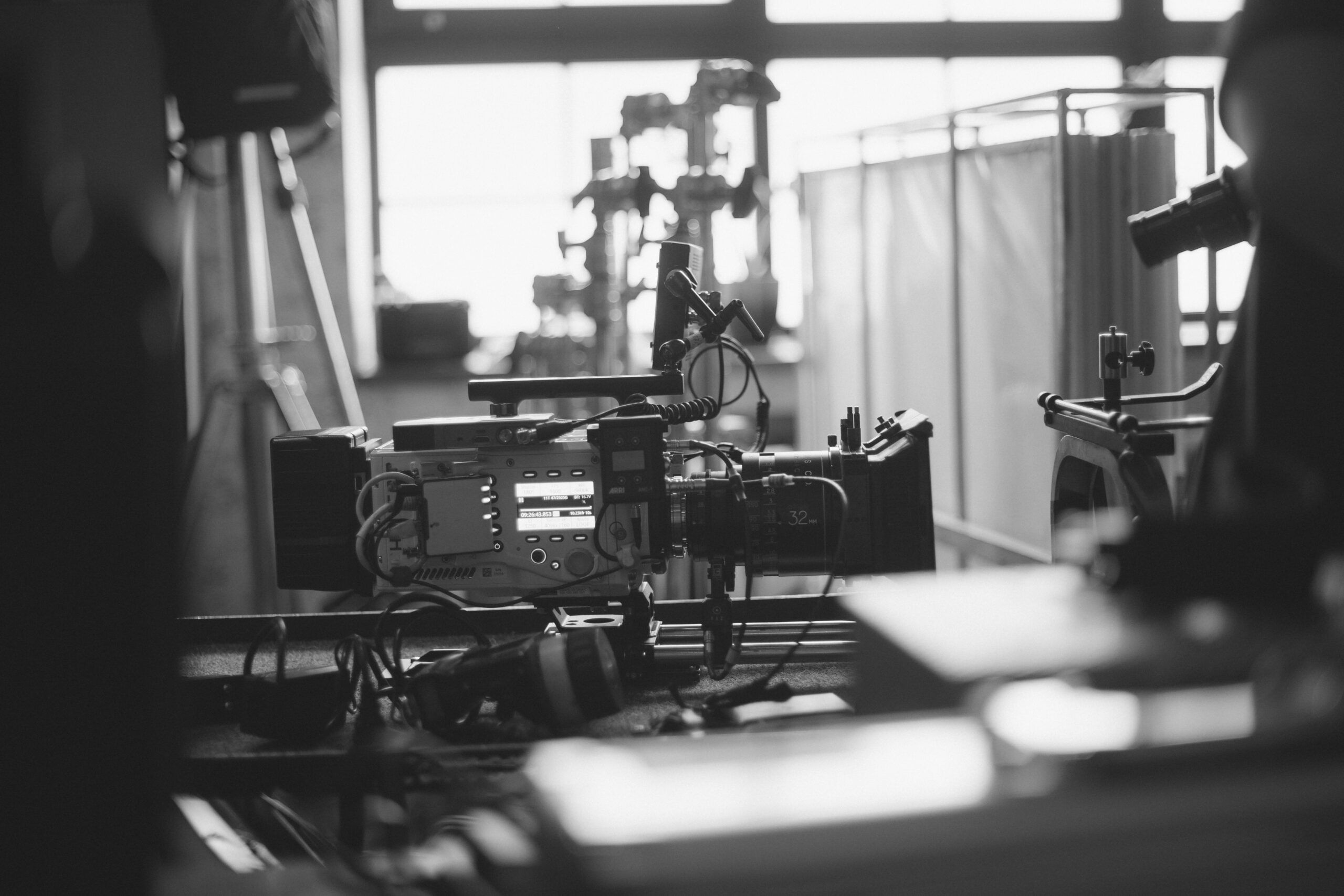 camera on track filming in studio black and white 2026 01 09 14 44 46 utc